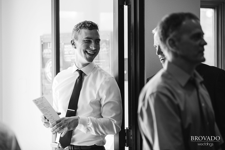 Usher passing out wedding programs