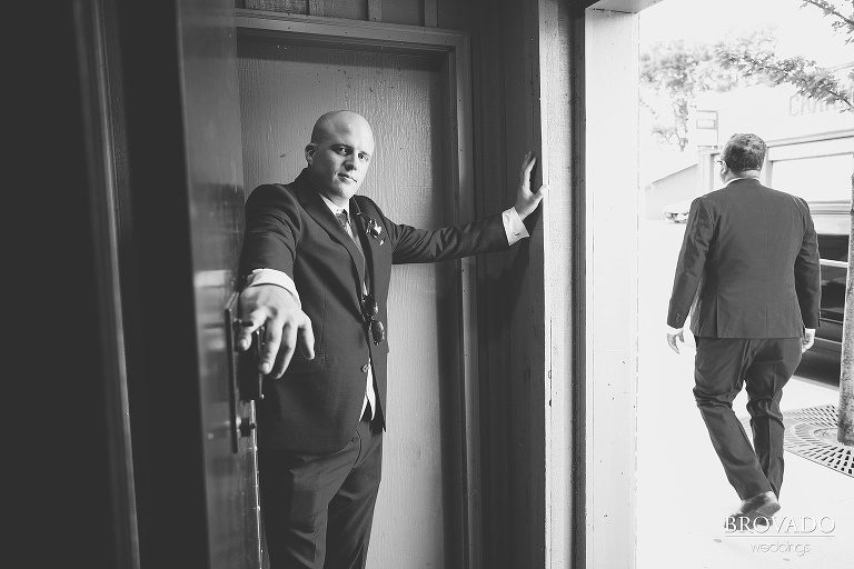 Derek holding open the bar door