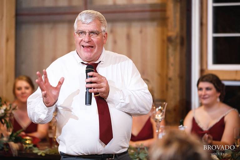 Brenna's father giving a toast