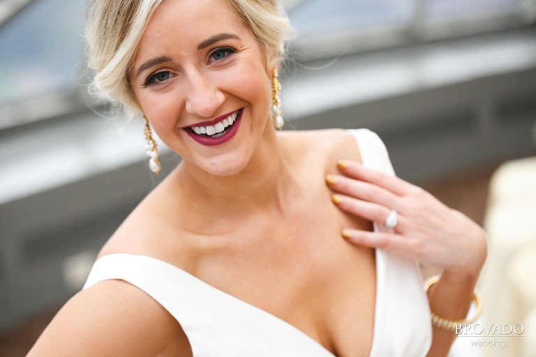 Portrait of Jenna in wedding dress with berry lipstick