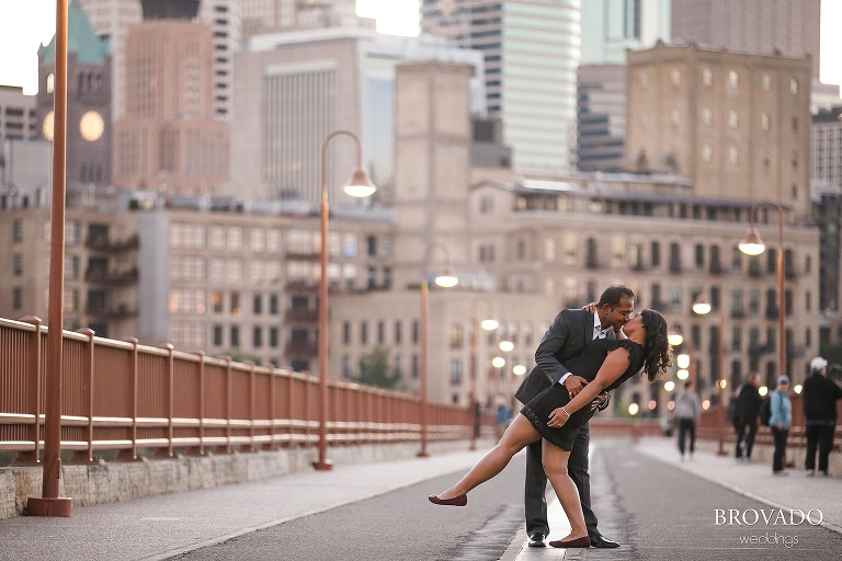 Roshni and Dharmik dressed up on the stone arch bridge