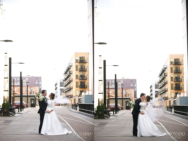 Hannah and Jason kissing on St Anthony Main