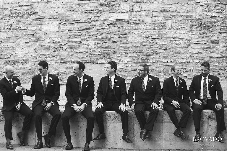 Goofy black and white pose of Jason and his groomsmen