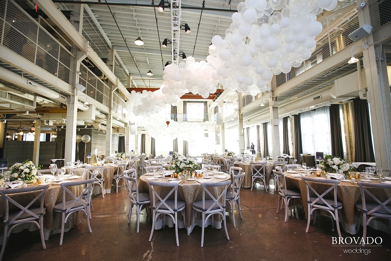 Gold wedding reception with white balloon installation by girl friday creative