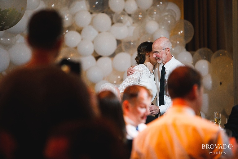 Bride Hannah hugging her father