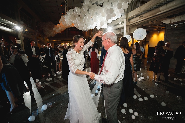 Hannah dancing with a wedding guest