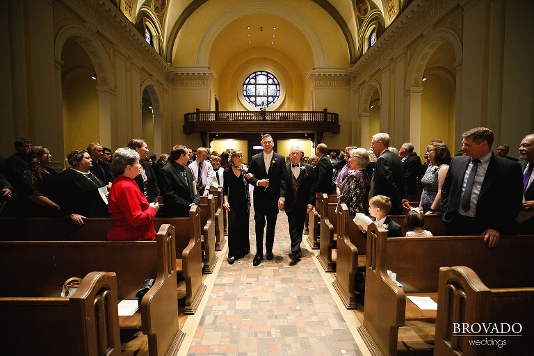 Ben's parents walking him down the aisle