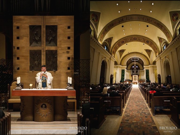 Priest holding up communion wafer at st thomas