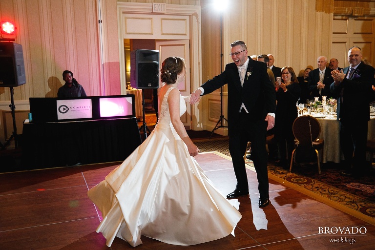 Ben twirling bride Megan for grand entrance