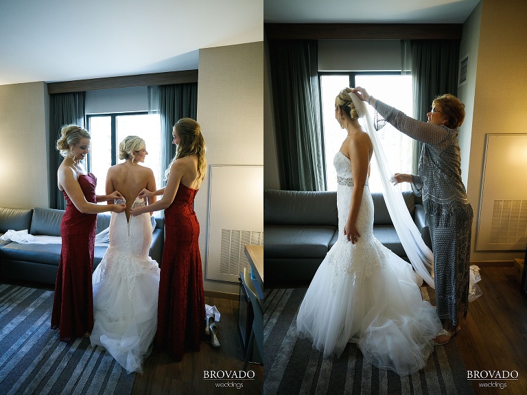 Hannah's bridesmaids and mother helping her get dressed