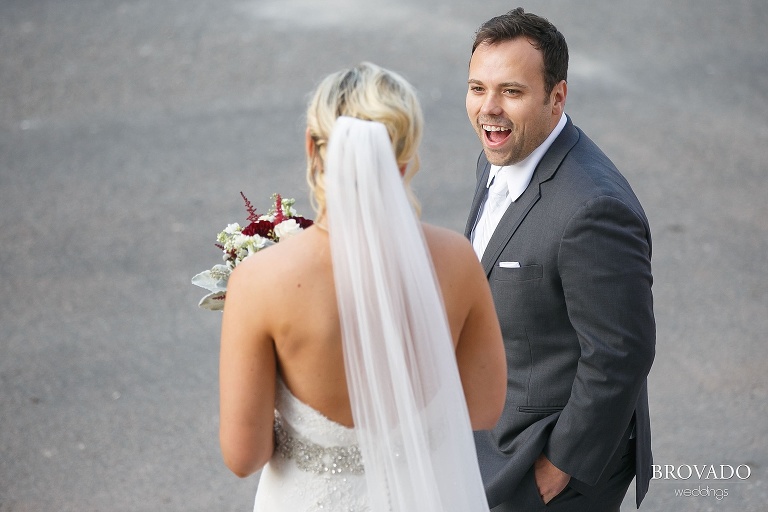 Groom Joe reacting to Rachel during their first look