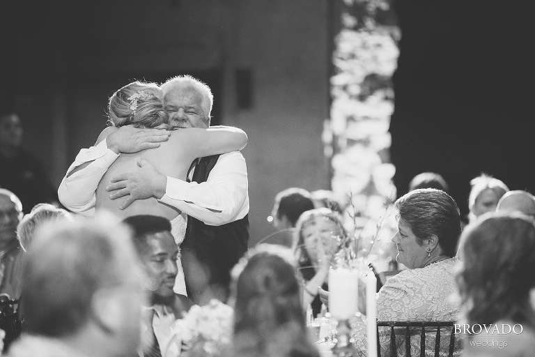 Rachel hugging the father of the groom
