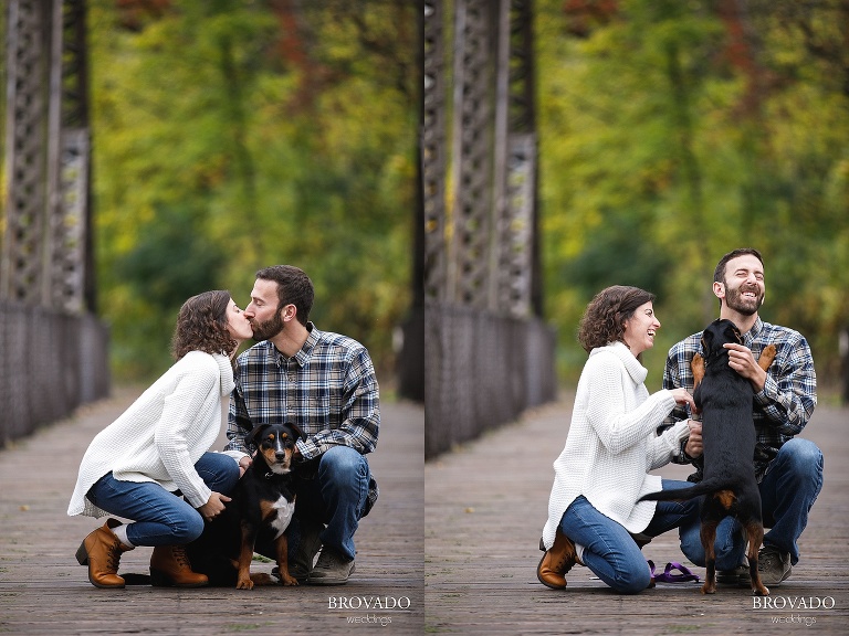 Stephanie and Loren kissing with their dog reba