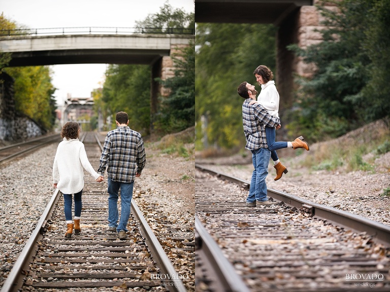 Stephanie and Loren walking down northeast minneapolis railroad tracks