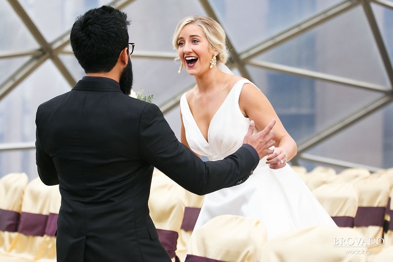 excited bride during first look