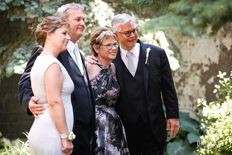 Family watching first look between bride and groom