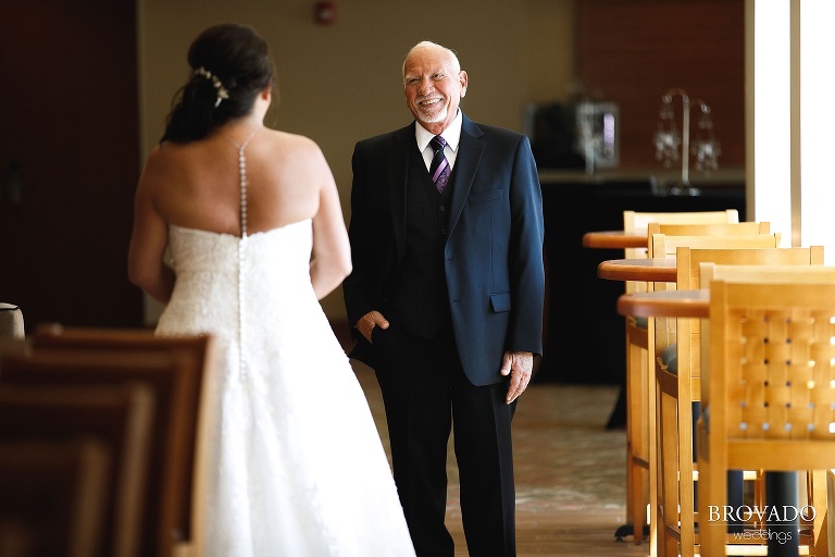 Groom Daniel smiling at bride Sally