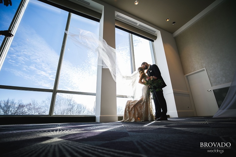 Veil toss at indoor winter wedding at Intercontinental riverfront st paul 