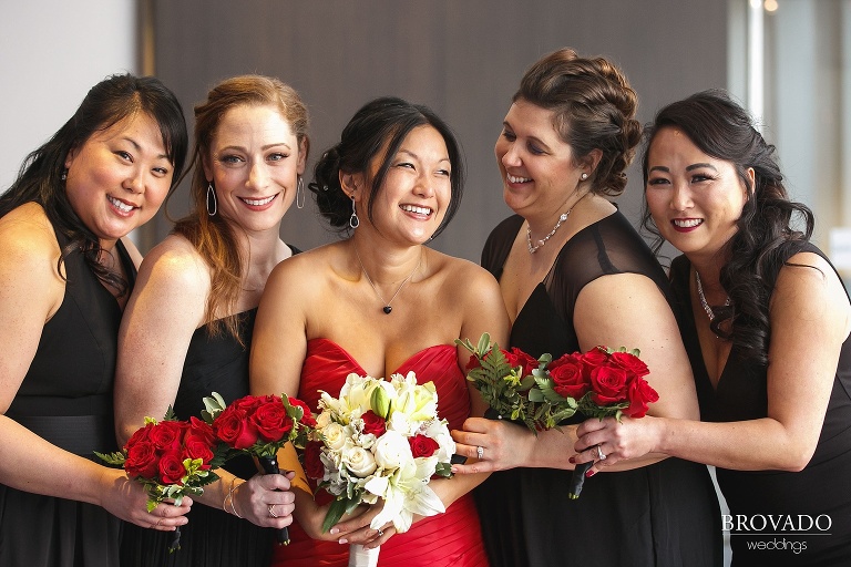 Christine laughing with her bridesmaids