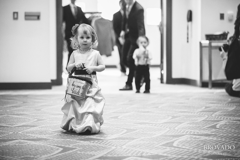 Flower girl walking down the aisle
