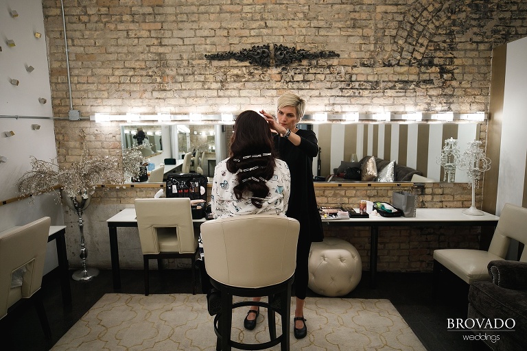 Bride Yevgenia having her makeup done