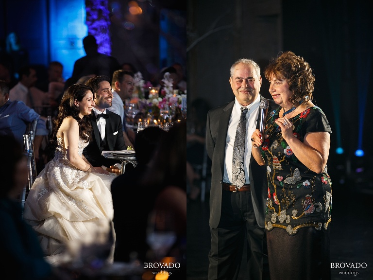Yevgenia and Eugene watching while parents give a speech