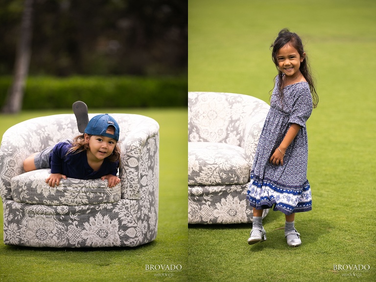 Akashi and Taka posing on a floral chair