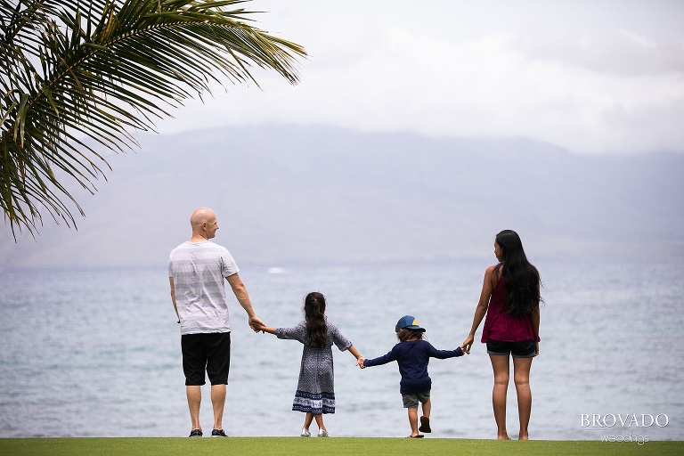 Family looking out on ocean from Maui