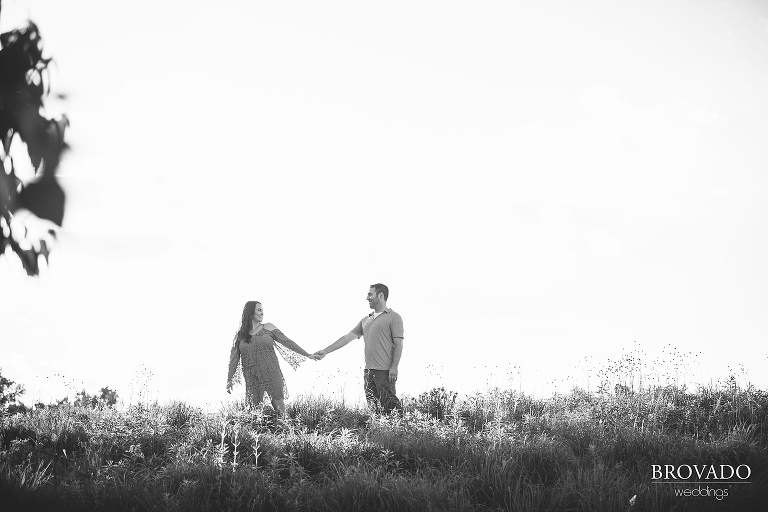 Jacquelyn leading Brian through a field