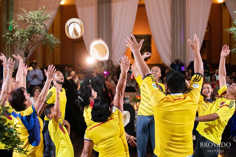 Lorena's family dancing in Colombian soccer jerseys