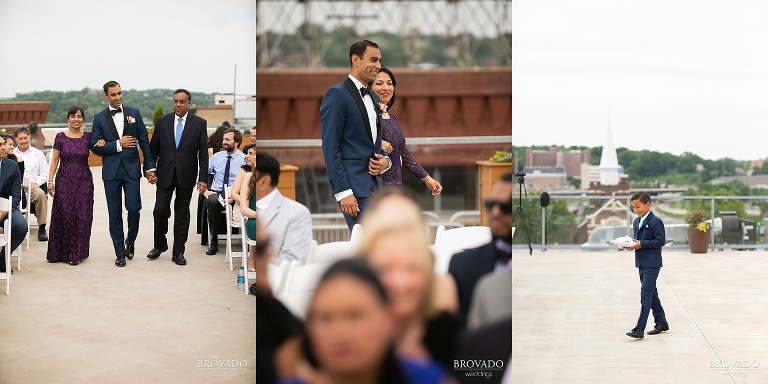 Rishi and his parents walking down the aisle