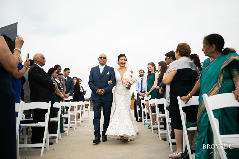 Bride's father walking her down the aisle