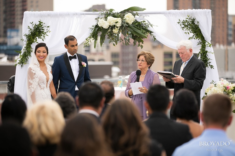 Rishi and Lorena's grandparents reading during ceremony