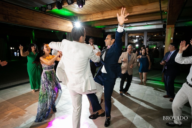 Rishi dancing with a groomsman
