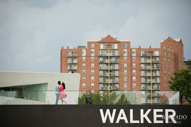 Taara and Glenn kissing on top of walker art center