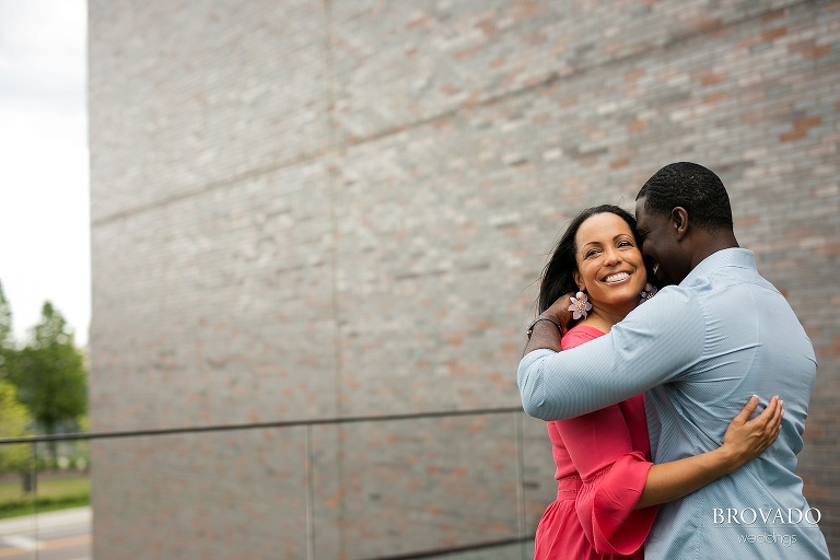 Taara and Glenndale embracing on walker art center rooftop