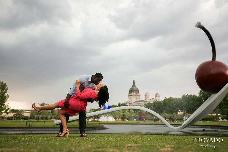 Glenn dipping his fiance in front of spoon and cherry bridge