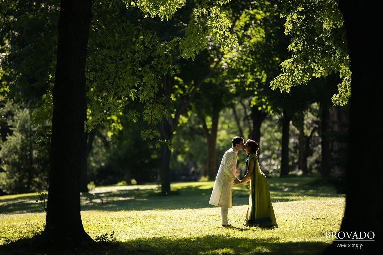 Shadowy lakeside engagement in indian attire