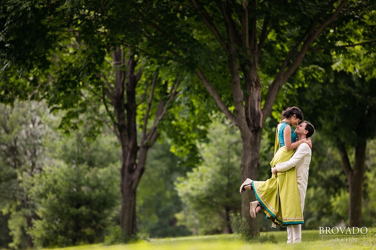 Ethan lifting up Sruti