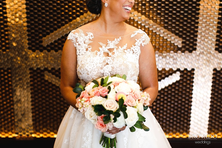 Closeup of bouquet and lace dress
