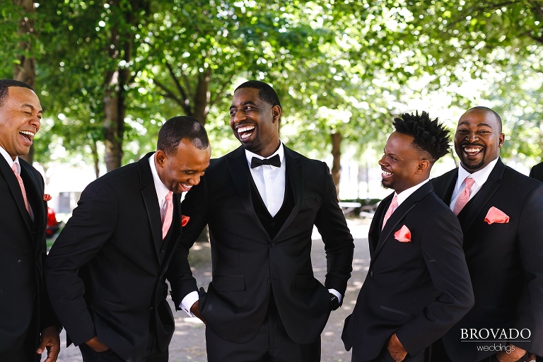 Glenn laughing with groomsmen