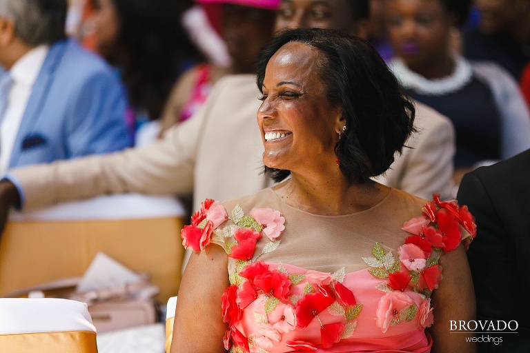 Mother of the bride smiling with her eyes closed