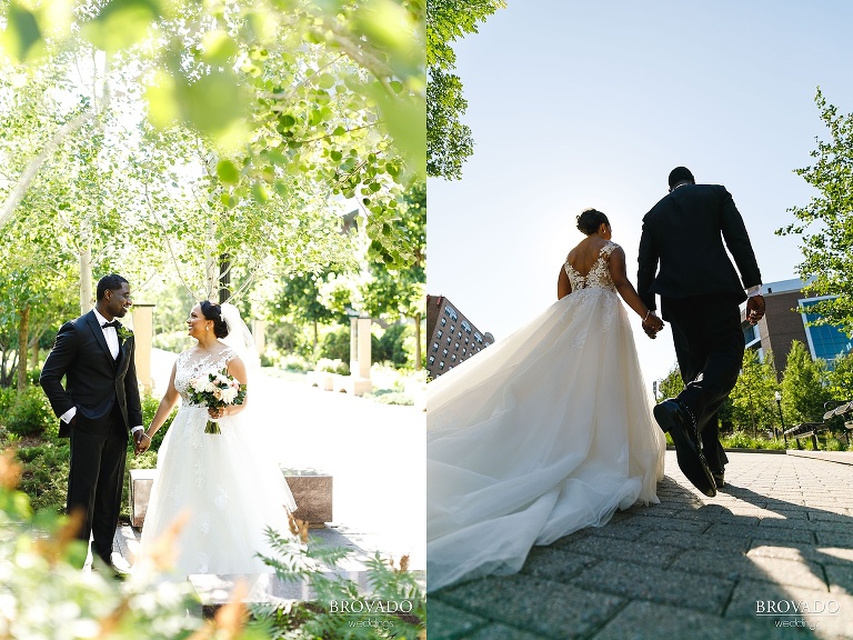 Bride and groom walking across stadium village