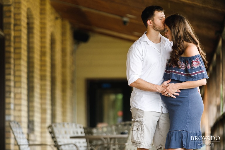 John kissing Nova on the forehead