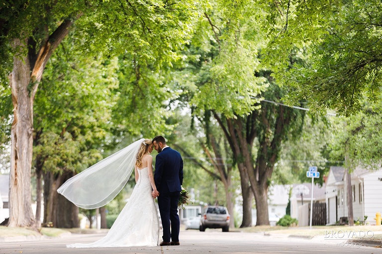 Bride and groom holding hands