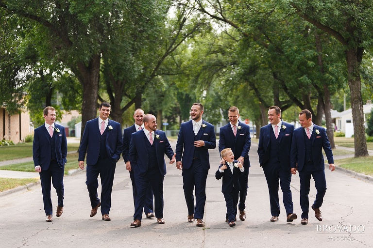 Groomsmen walking down the street