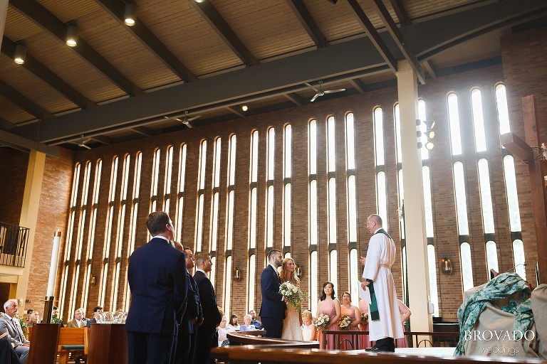 Aaron and Erin's wedding ceremony in their sunlit church