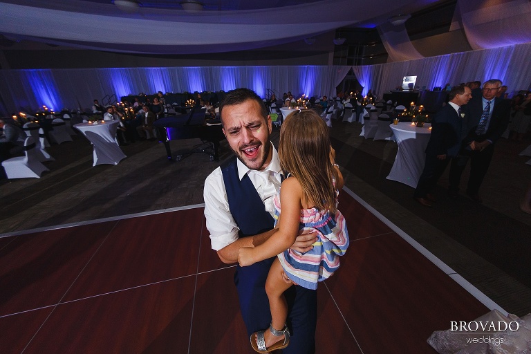 Aaron dancing with a family member