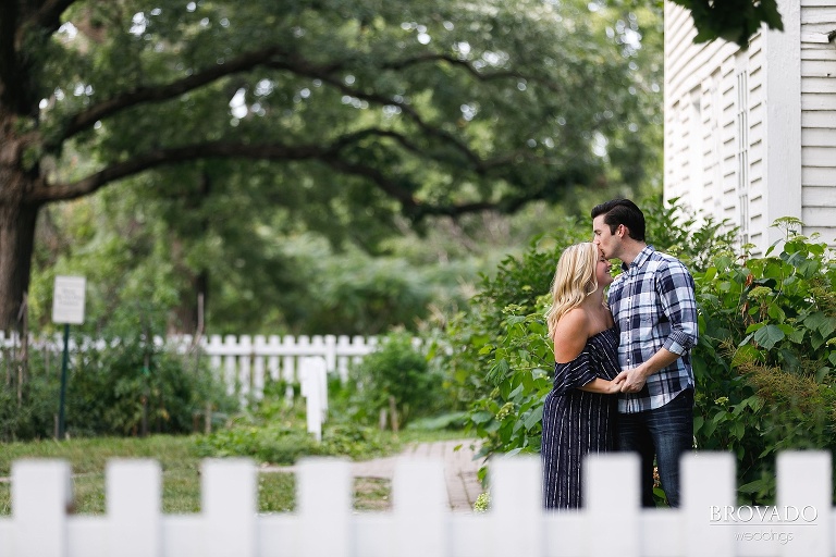 Zachary kissing Delaney on the forehead