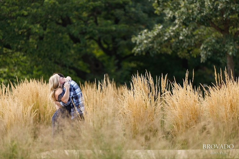 Delaney and Zachary hugging in wheat field
